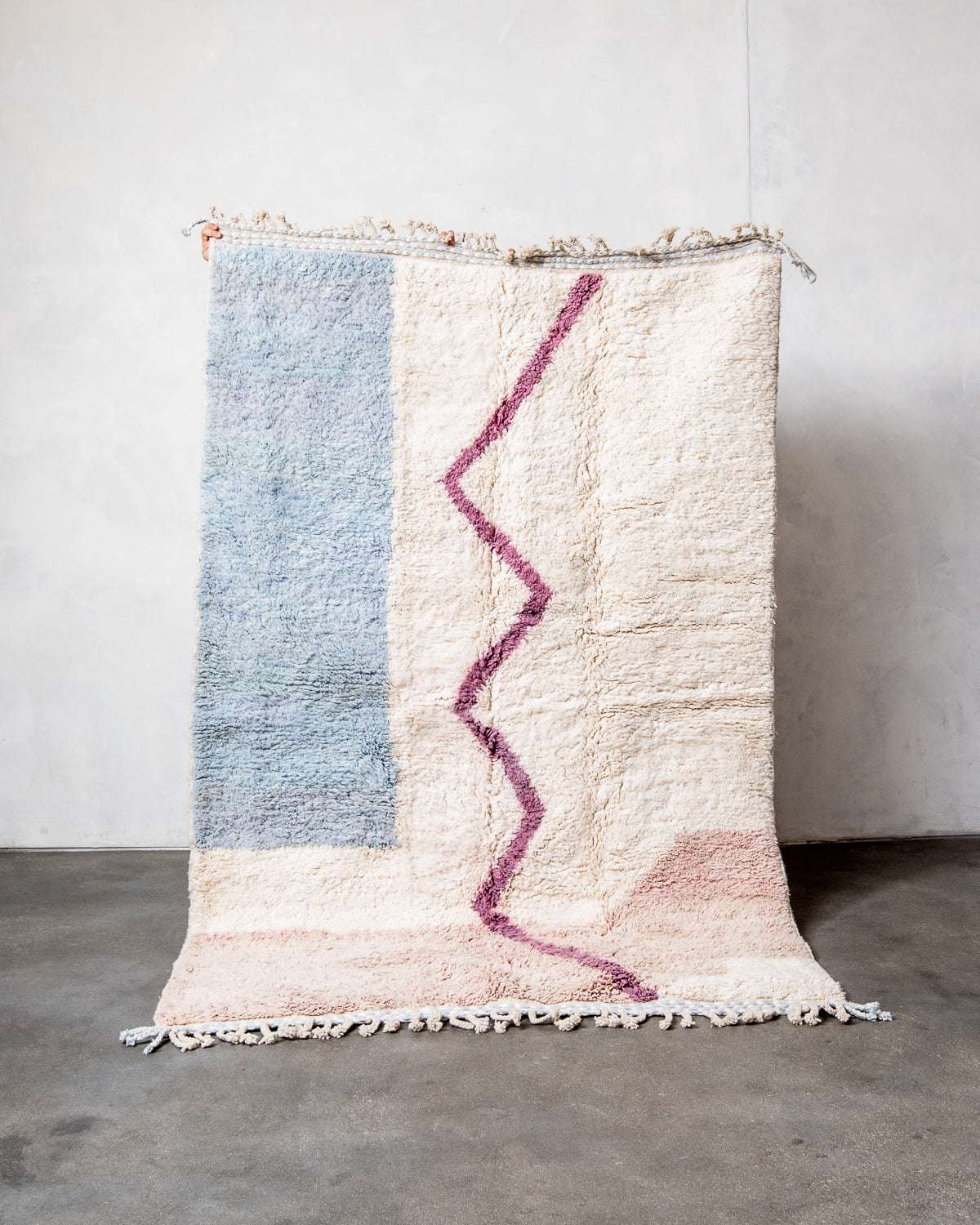 Modern, designer, handcrafted Berber rug from Morocco. Beniourain carpet with beautiful colours and patterns and fluffy wool texture.